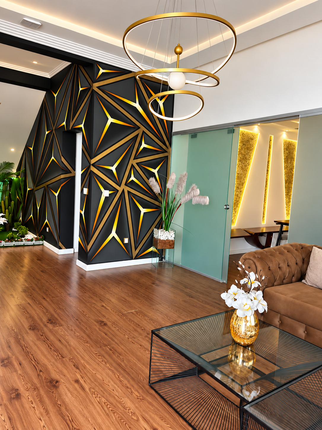 Área comum do GELS Business Center com sofá e decoração preta e dourada